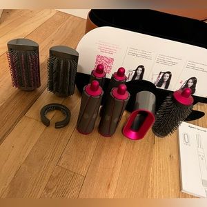 Dyson AirWrap Leather case and attachments.